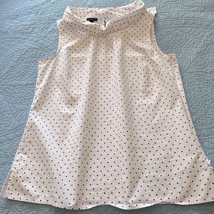 White cotton top with block dots.
